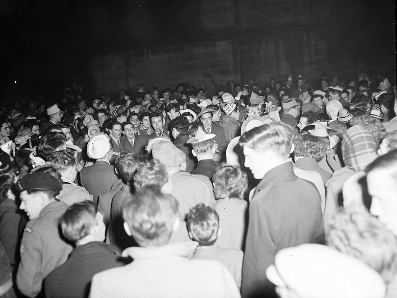 Revellers await the bog countdown at Edinburgh's Tron in 1954.