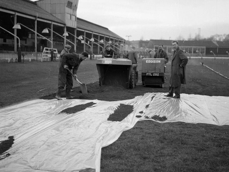 Powderhall, in Edinburgh, prepares a surface of red blaes for the New Year Sprint 1960.