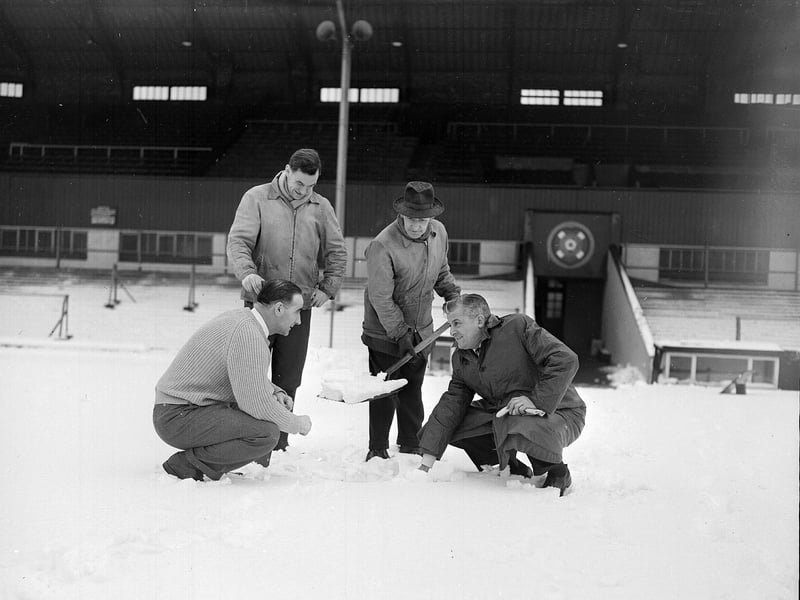 A pitch inspection at Tynecastle stadium in December 1962 shortly before the Hearts v Hibs Edinburgh Derby match on New Year's Day was called off.