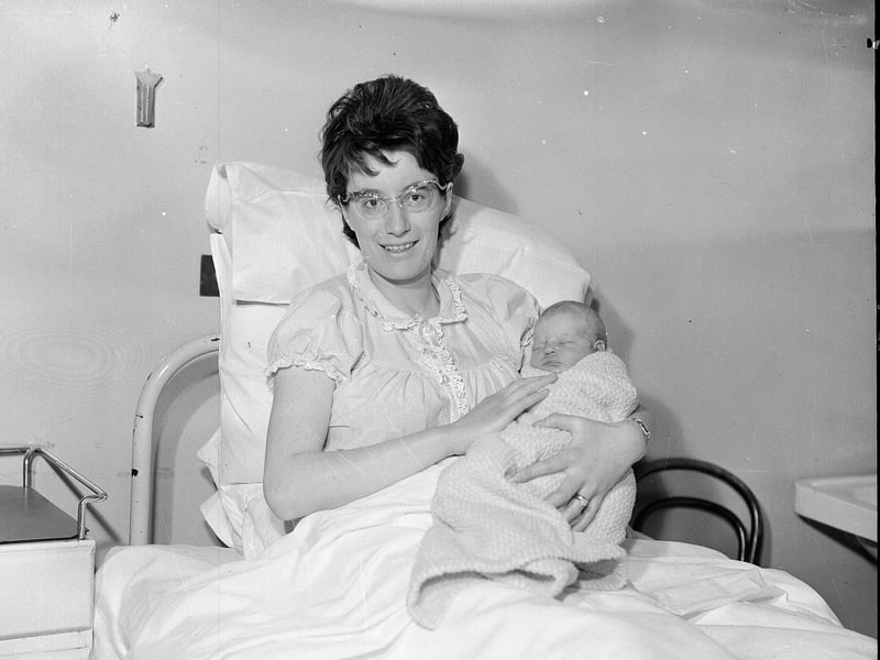 Mrs F Donaghue with her New Year baby Geraldine Ann in 1963.