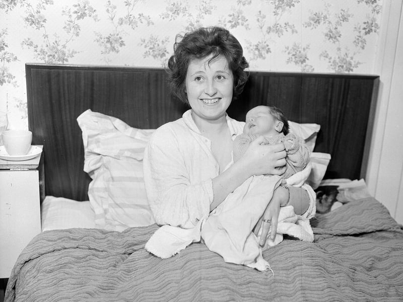 Mrs Hugh O'Hara with her New Year baby Louise in 1963.