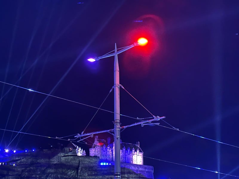 The Castle is captured in the crosshairs of the overhead power lines for the trams