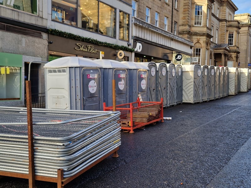 Portable toilets lined up in Hanover Street - just one of several places where conveniences are laid on the partygoers