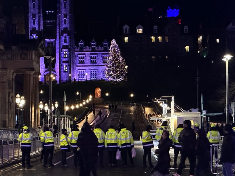 Security personnel at the foot of The Mound ahead of the concert and street party