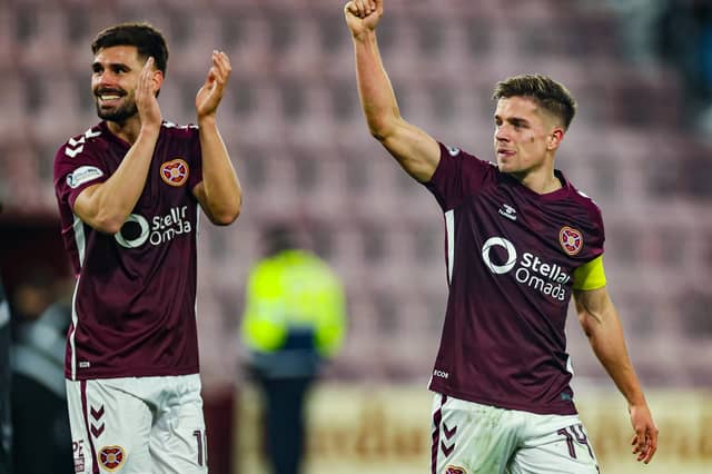 Hearts' Claudio Braga (L) and Cameron Devlin are both included in the Premiership team of the season so far. (Photo by Roddy Scott / SNS Group)