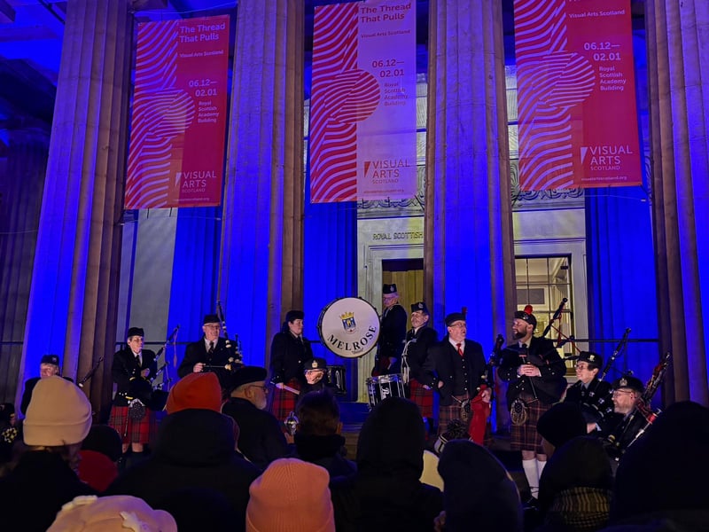 Scottish pipe band getting ready to play outside the National Gallery.