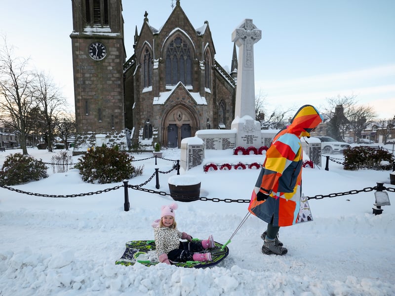 Colourful coats and snow sledges - perfect! 