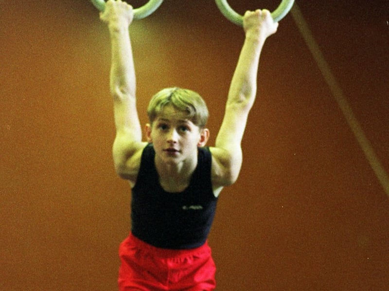 Todmorden's Tom Rawlinson, 11, pictured training on the rings at Calderdale School of Gymnastics in December 1998.