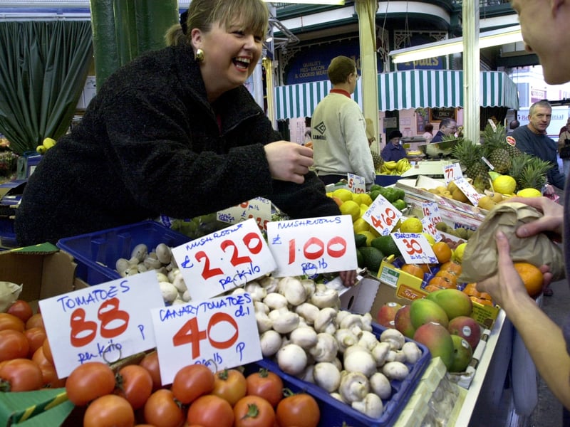 Shoppers were getting used to metrication for goods sold by weight. Pictured is Julie Smith at work on Ryan's fruit and veg store in Kirkgate Market.