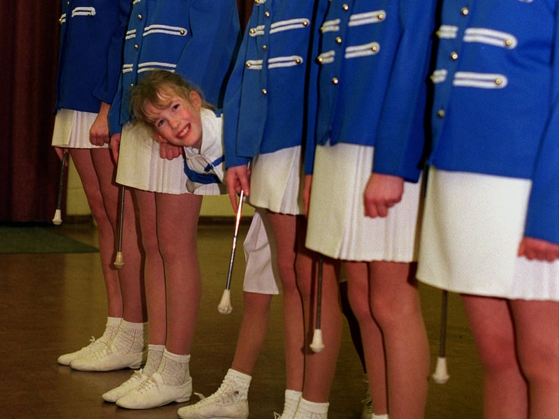 Finding a smile at the rehearsals at Stanningley Primary School is seven-year-old Rebecca Holmes, one of the youngest members of the Bramley majorettes who have been awarded money from  Millennium Fund. 