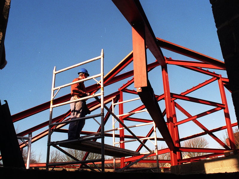 The village's new health centre under construction in November 1999.