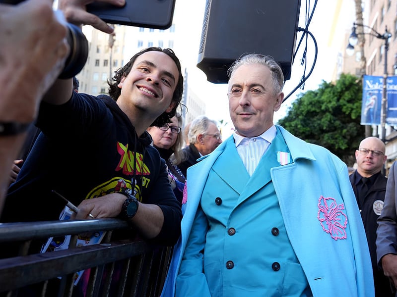 Alan Cumming poses for a photograph on Hollywood Boulevard.