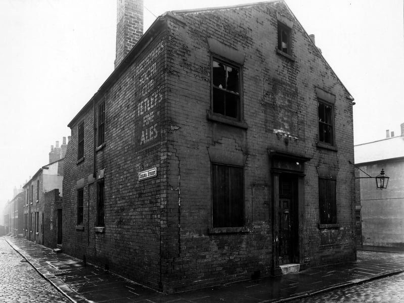 The north side of Meynell Street on corner with Chelsea Street, 'Railwaymens Social Club' (derelict). The corner of Greenwich Street is visible. Pictured in November 1949.