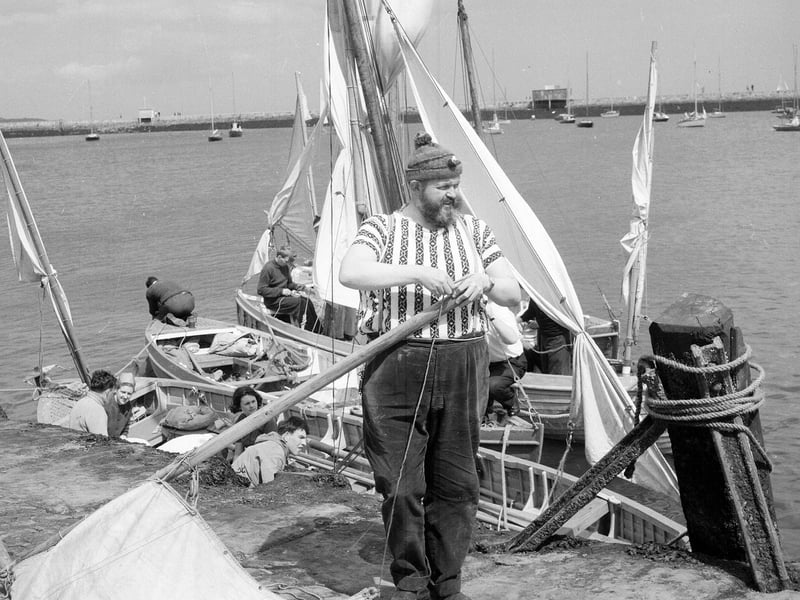 Mr Ron Fraser of Portobello prepares for the yacht racing a Granton Harbour in July 1965.