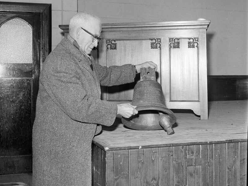 Mr James Orr inspects a bell at Granton Congregational Church in December 1964.