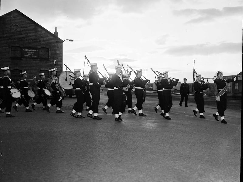The HMS Claverhouse pipe band marches back to the training centre at Granton after an inspection in May 1962.