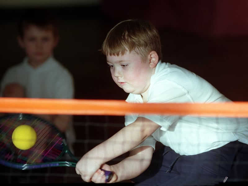Pupils from St Michael's C of E Primary had a chance to try short tennis when Lawn Tennis Association development coach Peter Clynes visted their school to give a demonstration of the sport. Pictured playing a stroke is Shayne Whyte.
