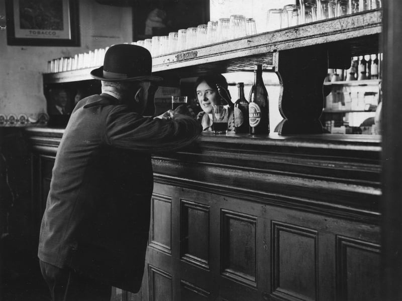 The old fashioned long bar in the vault at the Star Inn , South Shore, Blackpool,  was already 100 years old when this picture was taken in 1931. The bar was 5 yards long with a wooden shelf for glasses above it