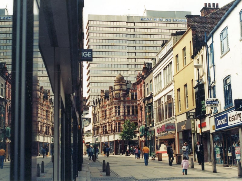 Commercial Street looking west from the direction of Briggate. The tree stands at the junction with Lands Lane. West Riding House dominates the background and is situated in Albion Street.