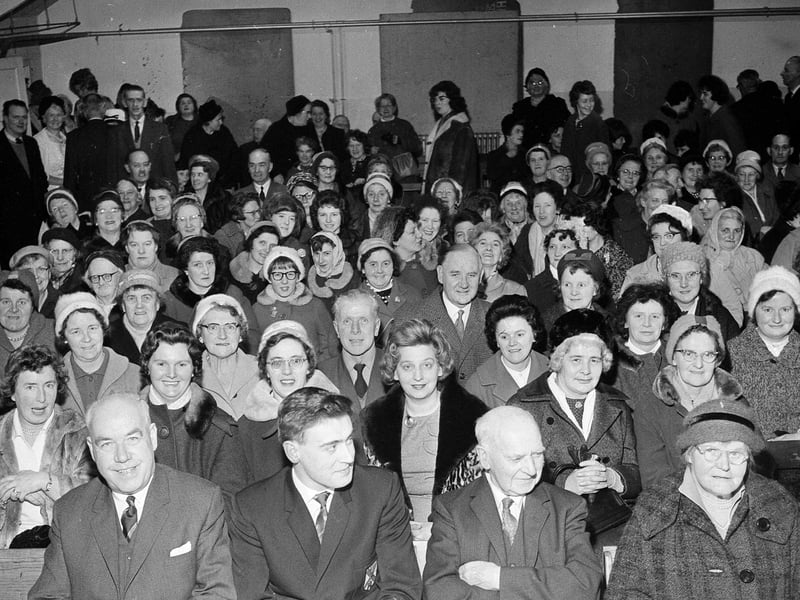 The congregation witness the induction of new minister Rev Ronald N Sewell from Wigtown at St David's Church of Scotland, Broomhouse, in January 1964.