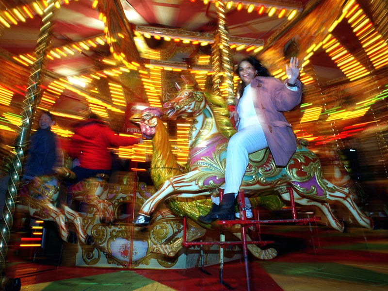 Meena Jhakea enjoys the merry- go-round at the Valentine's Fair.