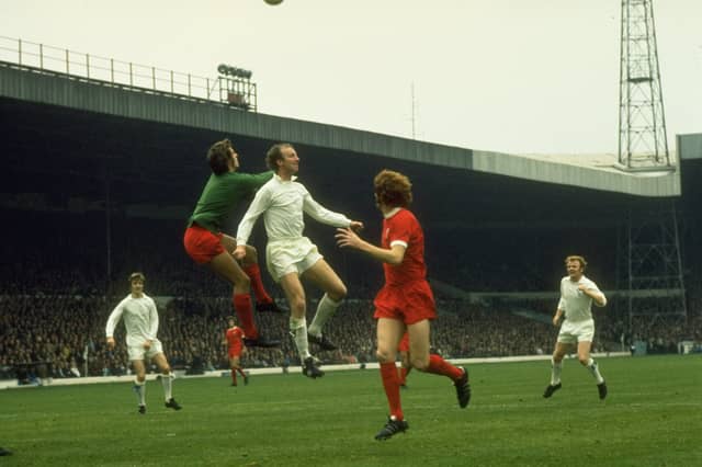 Jack Charlton of Leeds United and Liverpool goalkeeper Ray Clemence both jump for the ball during a Football League Division One match at Elland Road in September 1972
