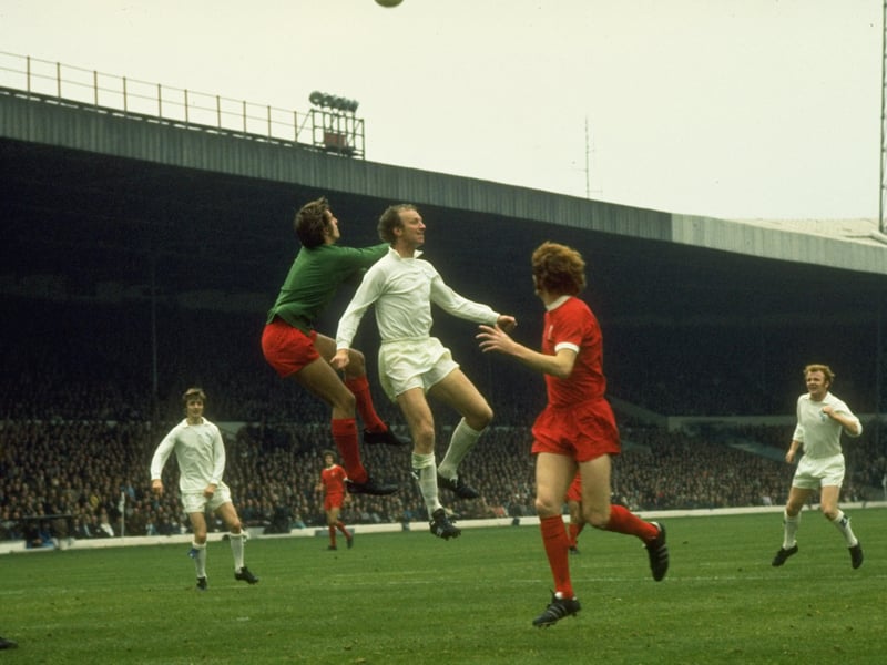 Jack Charlton of Leeds United and Liverpool goalkeeper Ray Clemence both jump for the ball during a Football League Division One match at Elland Road in September 1972