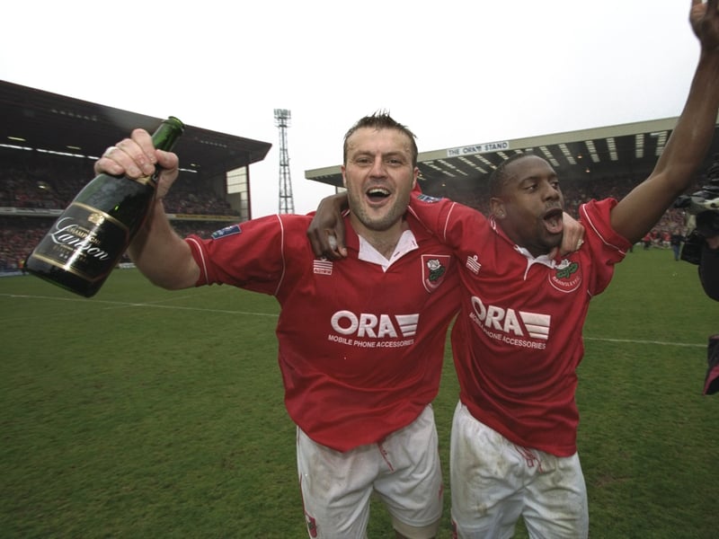 Neil Redfearn (left) and Clint Marcelle celebrate at Oakwell in April 1997 after Barnsley beat Bradford to secure promotion to the Premiership