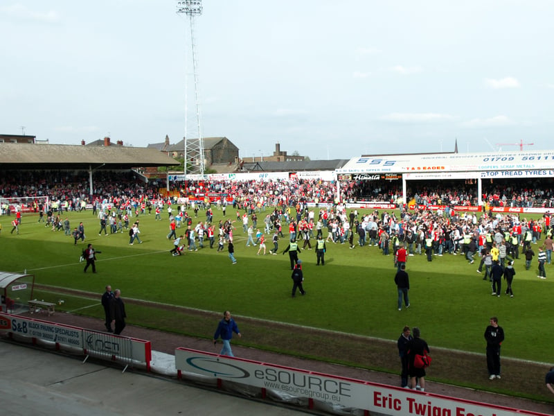 Fans on the pitch at the end of Rotherham United's last match at their old Millmoor home, a 1-0 victory against Barnet on May 3, 2008
