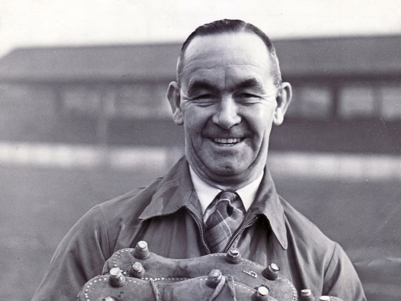 Rotherham trainer Mark Hooper pictured holding a pile of boots at the club'sMillmoor ground in 1973