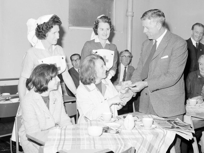 Blood donor badges being presented by Councillor William Wallace at the Sighthill Health Centre in August 1965.