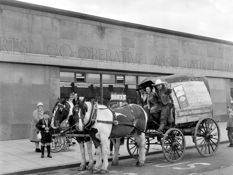 A covered wagon outside the Sighthill branch of St Cuthberts' Co-operative Association Ltd in March 1966.