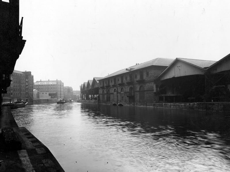 Looking east from Leeds Bridge, past British Waterways warehouses. In the distance can be seen the warehouse of Joseph Rank Ltd, Millers, later to become Calls Landing Restaurant complex. Pictured in October 1950.
