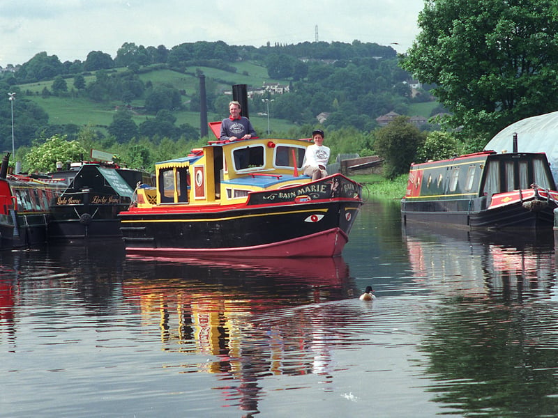 Brian and Linda Best sail their cruiser 'Bain Marie' featured on C4 TV show Cook on the Wildside along the Calder and Hebble Navigation at Shepley Bridge Marina in June 1998.