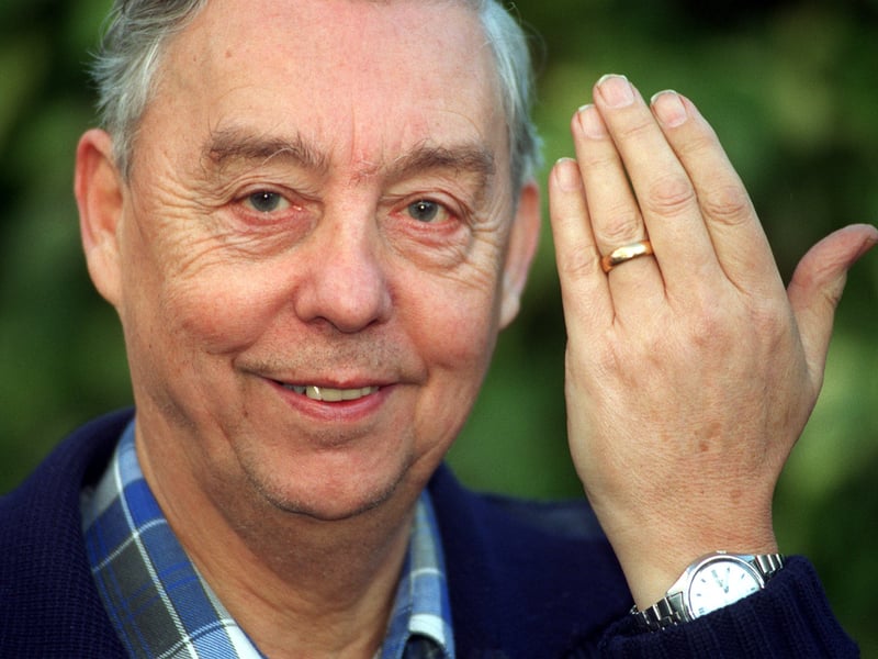 This is Colin Fretwell who lost his late wife's wedding ring while pushing papers into a skip at the back of Mirfield Library.  With the use of a metal detector he has managed to find it  undamaged. Pictured in January 1998.