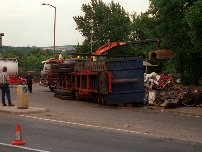 An over turned lorry caused traffic problems at Cooper Bridge roundabout in June 1997.