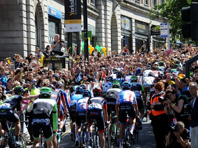 The riders make their way up The Headrow.