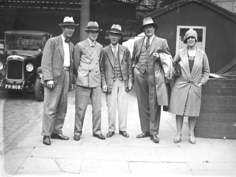 eddy Baldock (2nd from left), World bantam weight Champion 1927, is greeted by Cecil Parkin ,4th from left, (England cricketer?) when he arrived in Blackpool in 1928 for his fight with Bugler Lake.