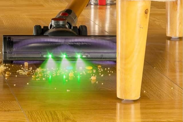 There's a handy green light to help you see the dust on your floors