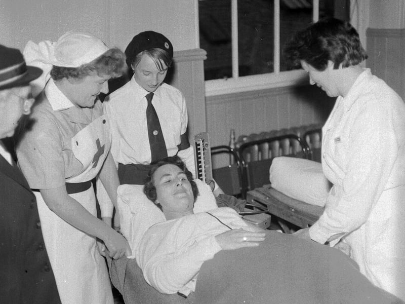 Mrs R Howell gives blood in a mobile unit of Blood Transfusion Service at Musselburgh Town Hall in July 1965.