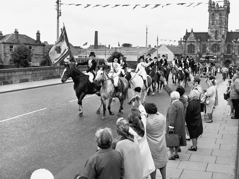 Musselburgh's Lad and Lass lead the procession through the streets of the Honest Toun in July 1966.