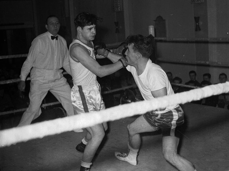 Jimmy Fairbairn and Peter Reid boxing at Musselburgh Legion Hall in December 1962.