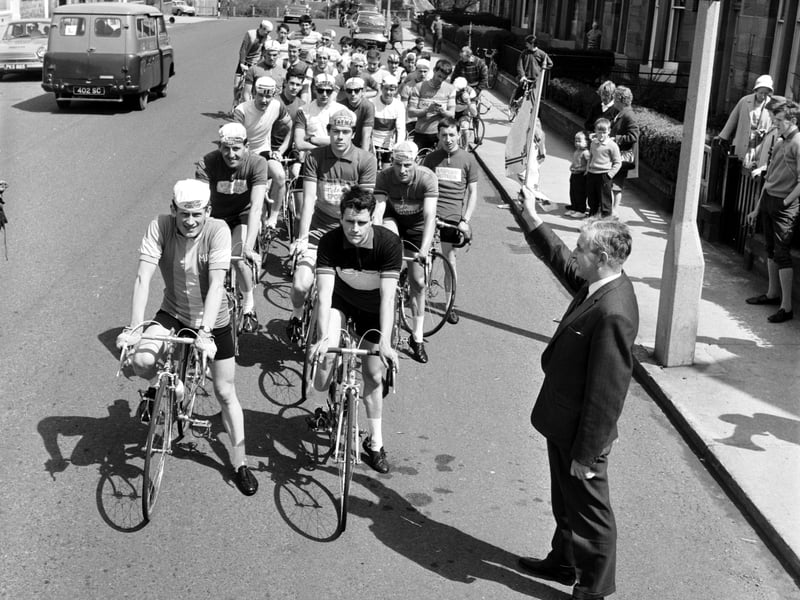 Eddie Jenkinson, sports editor of the Evening News & Dispatch, prepares to set riders off on the final stage of Musselburgh Roads Club's two-day cycle event in May 1966.