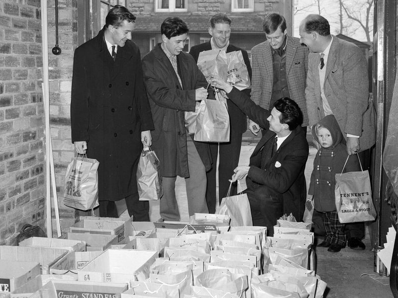 Members of the round table distribute groceries to the old age pensioners of Portobello and Musselburgh in December 1964.