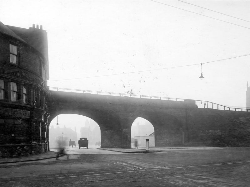Lloyds Arms is to the left of this photo from November 1931. Railway bridge runs across the centre of the image with the line running trains to and from Leeds City Station. Tramlines run along Duke Street. Church in distance to right.