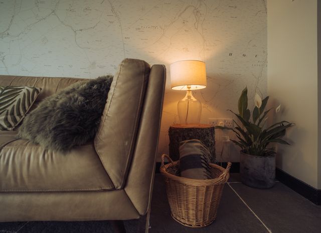 The living area features comfortable sofas.