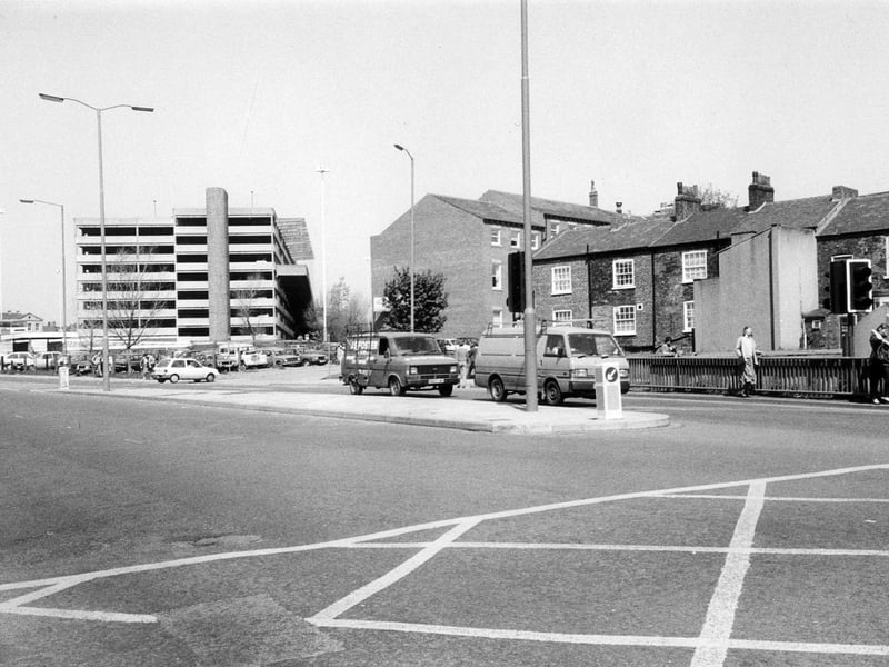 Woodhouse Lane showing Queen Square on the right and the multi-storey car park on the left.