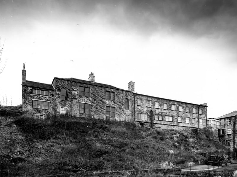 Cottages and 'laundry' building at Armley Mills, Leeds Industrial Museum, after tree clearance in February 1988. Leeds City Council had reopened Armley Mills as a museum in 1982 after it was closed as a manufacturing mill by Bentley and Tempest in 1969.
