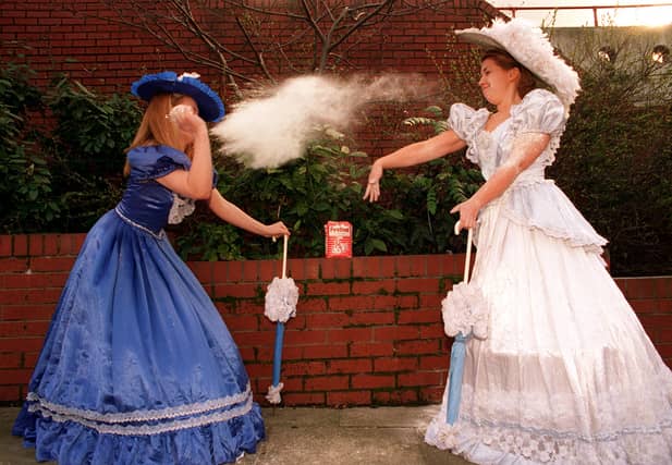 The Co-op was celebrating 150 years in business. Pictured is Joanne Nicholson, left, and Angela Latham during a flour fight at the Super C supermarket where they are selling flour for 1p as part of of the festivities.