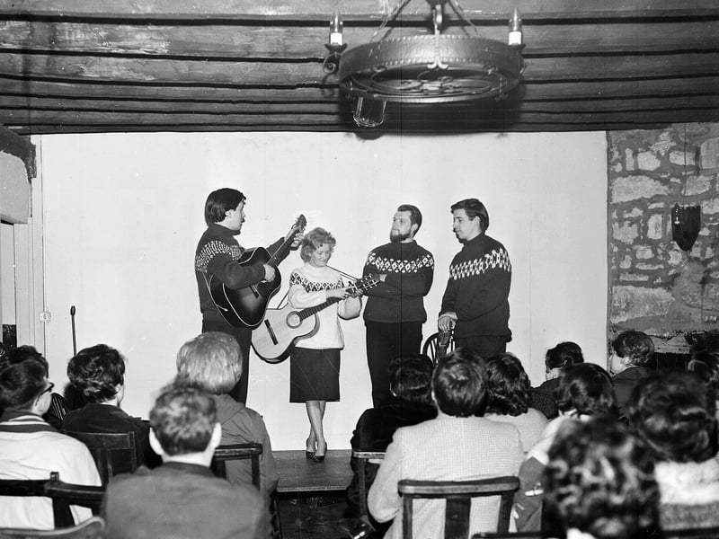 The Corrie Folk Trio and Paddie Bell singing at Tryst Coffee House as part of the Pilton Festival in March 1963.